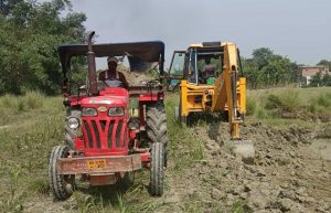 Bihar News- Application given to mining department for illegal deep digging in fields with JCB machine.