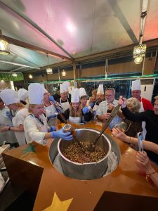 Agra News- On the occasion of World Tourism Day, a cake mixing ceremony was held at Hotel Clarks Shiraz