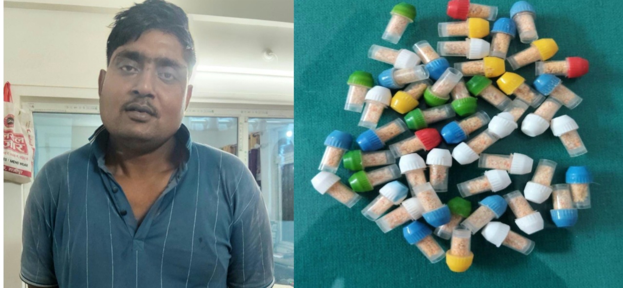 रंदाहा में स्मैक बरामद करने के बाद आरोपी को पकड़ती पुलिस
